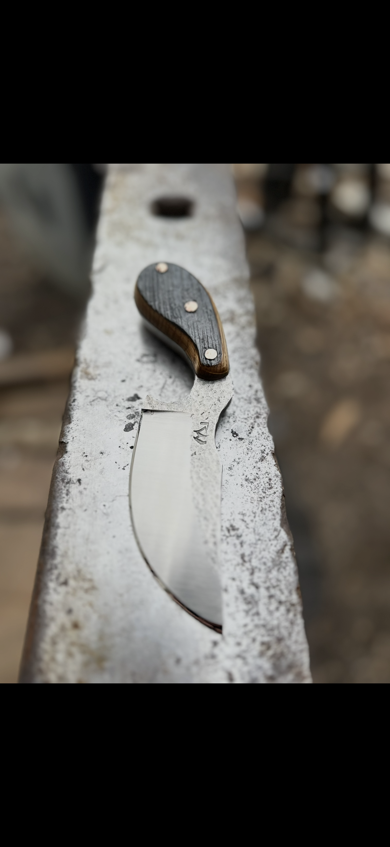 Small skinner blade on concrete ledge